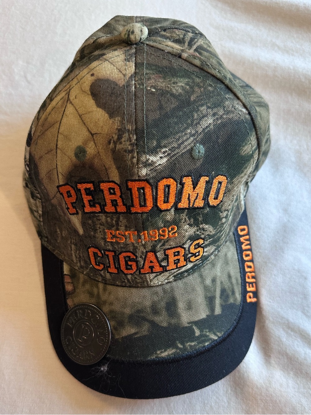 Camouflage Baseball Cap - Olive Green with Orange Logo